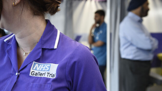 Close up of the uniform of an NHS-Galleri trial nurse on a mobile unit